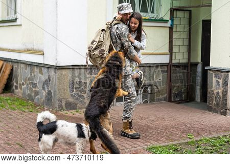 Military Father Meeting With Daughter And Dogs