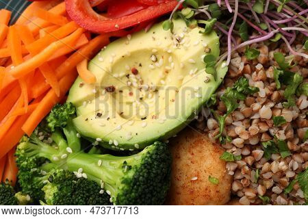 Delicious Vegan Bowl With Avocado, Broccoli And Buckwheat As Background