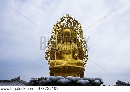Ancient Golden Jijang Bosal Statue On Stone Rock Cliffs For Korean People Travelers Travel Visit And