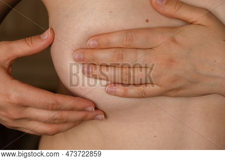 Unrecognizable Women Topless Doing Self-checks For Breast Cancer. Bse Checking Up Breast Changes, Po