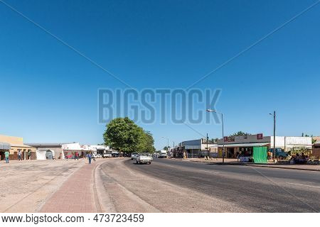 Keimoes, South Africa - Feb 25, 2023: A Street Scene, With Businesses, People And Vehicles, In Keimo