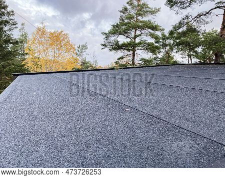 Evenly Laid Roofing Material On The Roof Of The Building. Ruberoid