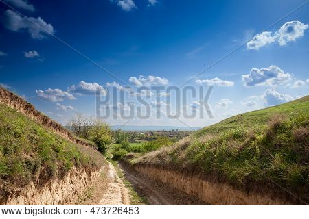Panorama Of Titelski Breg, Or Titel Hill, In Vojvodina, Serbia, With A Dirtpath Countryside Road, In