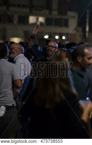 August 22, 2022 - Madrid, Spain. An Adult Spanish Man With Glasses Smiles And Waves To His Friends I