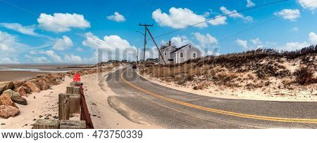 Blue Sky Over Roadway Along Chapin Beach In Cape Cod, Massachusetts.