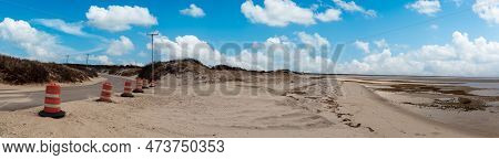 Blue Sky Over Roadway Along Chapin Beach In Cape Cod, Massachusetts.