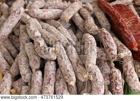 Traditional Meat Products Sold At A Street Stall During The Farmers Market In Cremona, Lombardy, Ita