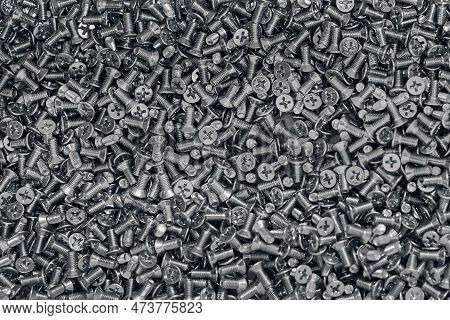 Bunch Of Galvanized Stainless Bolts With Flat Countersunk Head, Hardware Background. Lot Of Galvaniz