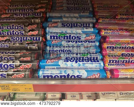 Amsterdam, Netherlands - March 26, 2023: Display Of Various Flavors Of Mentos Candy  For Sale At A G