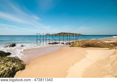 Walk Along The Atlantic Ocean On The Beach Called Praia Da Ilha Do Pessegueiro Near Porto Covo, West