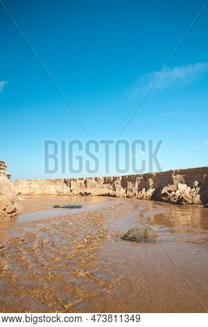 Walk Along The Atlantic Ocean On The Beach Called Praia Da Ilha Do Pessegueiro Near Porto Covo, West