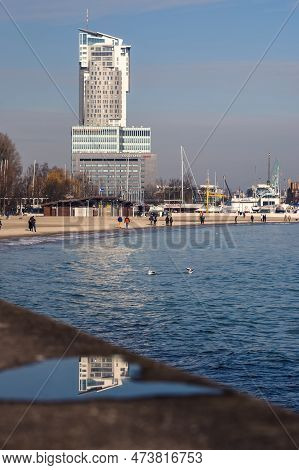 Gdynia, Poland - February 14, 2020: Tourists On The City Beach In Gdynia, Poland.