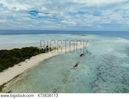 Aerial Drone Of Island With Beach And Coral Reef In The Tropics. Pom Pom Islet. Tun Sakaran Marine P