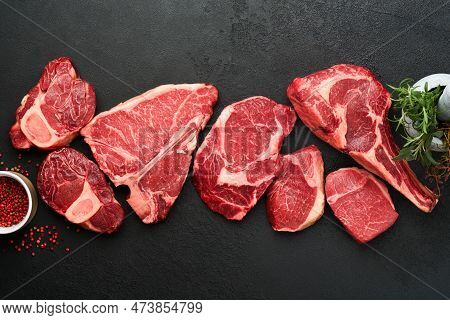 Raw Prime Steaks. Variety Of Fresh Black Angus Prime Meat Steaks T-bone, New York, Ribeye, Striploin