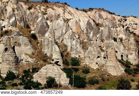 Mushroom-shaped Rocks (also Called The Fairy Chimney) With Caves Inside In The Goreme National Park 