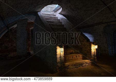 Dark Basement Of An Old Antique Building. Staircase In The Dungeon Of The Cathedral Of The Nativity 