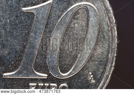 Partial Extreme Close Up Of A Ten Euro Cent Cents Brass Coin As Concept For Cash And Euro Coins