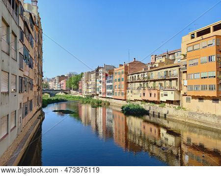 March 2023, Girona, Catalonia. Hanging Houses Of Onyar, Girona. Panoramic View Of The River And Old 
