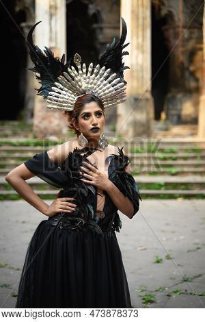 Fashion Portrait Of Beautiful Indian Model In Halloween Costume, Gothic Makeup, Posing Fashionable I