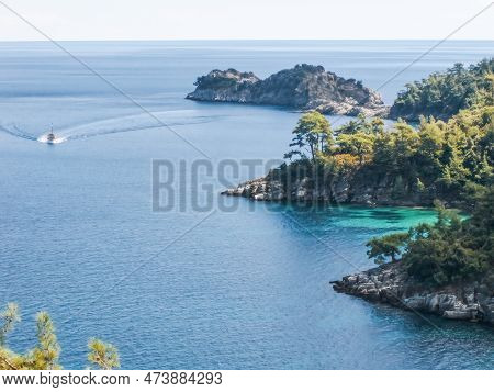 Boat On The Blue Of Aegean Sea Of Greece Summer Travel Destination.