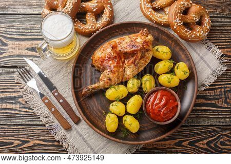 Oktoberfest Festival Food Half Fried Chicken With Boiled Potatoes, Sauce, Beer And Pretzels Close-up
