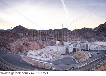 Hoover Dam Is A Concrete Arch-gravity Dam In The Black Canyon Of The Colorado River, On The Border B