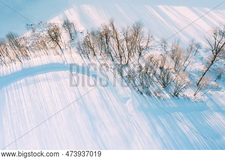 Amazing Aerial View On Freezing River. Aerial View Flight Above Frozen Creek. Scenic View Of Nature.