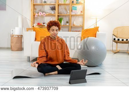 Yoga Mindfulness Meditation. Young Healthy African Girl Practicing Yoga At Home. Woman Sitting In Lo