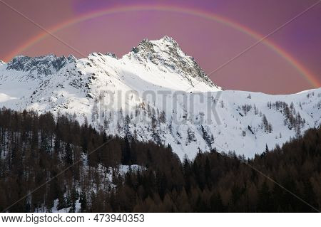 View Of Valle Aurina With Beautiful Rainbow In The Winter Season, Alto Adige, Italy