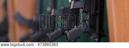 Rifles Or Air Rifles On A Rack Are For Sale. Weapons For Police Concept