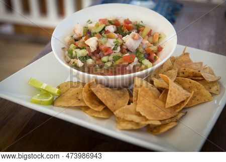 A Conch Ceviche Served With Tortilla Chips