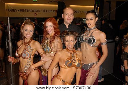 Paula Labaredas, Phoebe Price, Jamin Fite, Alicia Arden and Annisse at the annual Slave Leia Group Photo at ComicCon, San Diego Convention Center, San Diego, CA. 07-23-10