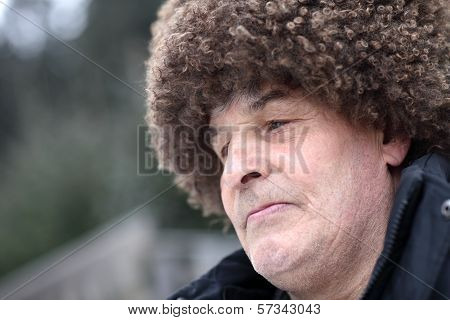 Man In Brown Papakha