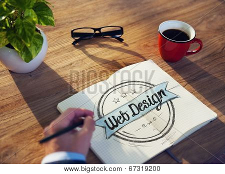 Man with a Note Pad and Web Design Concept