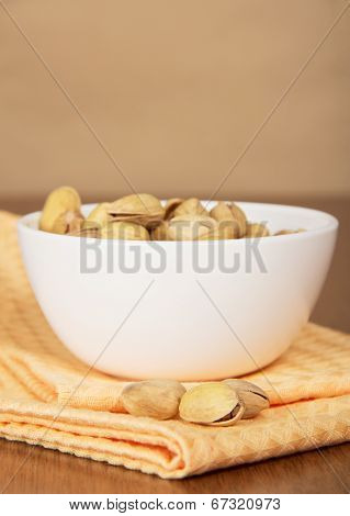 Faience bowl with pistachios