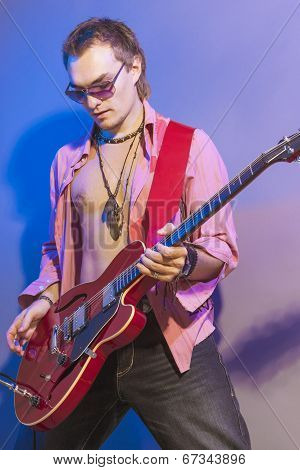 Portrait Of A Professional Guitarist With Electric Guitar