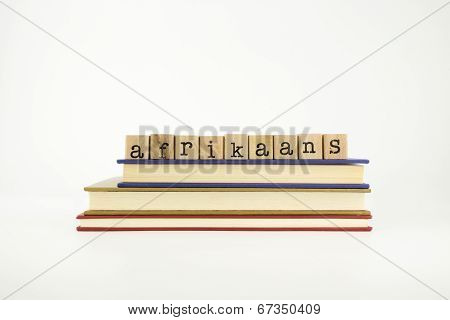 Afrikaans Language Word On Wood Stamps And Books