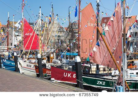 Decorated Traditional Fishing Ships In The Harbor Of Urk, The Netherlands