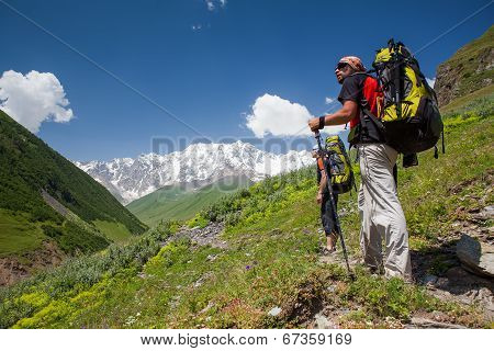 Hikers In Caucasus Mountains Of Zemo (upper) Svaneti, Georgia