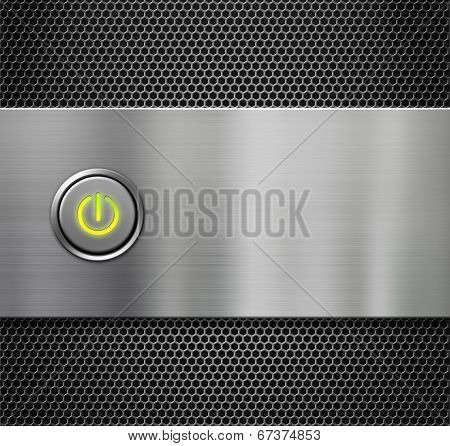 computer power or start button on metal background