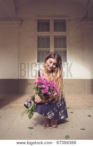 Fashionable Woman Wearing A Blue Floral Print Dress, Gold Shoes