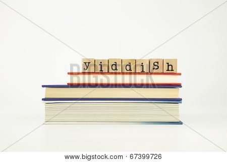 Yiddish Language Word On Wood Stamps And Books