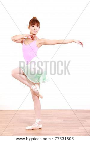 woman dances ballet