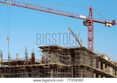 Building site with crane on sky background