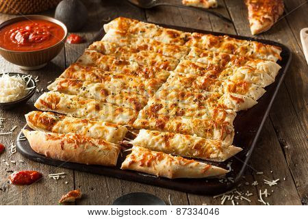 Homemade Cheesy Breadsticks With Marinara