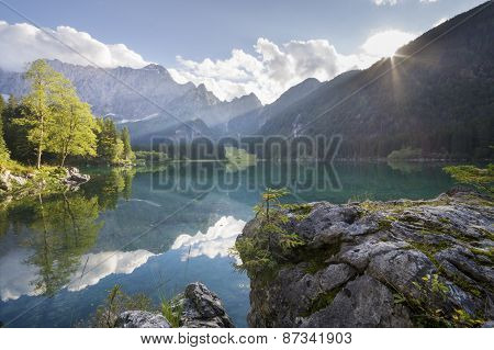 Alpine lake,Sunrise over the alpine lake Laghi di Fusine