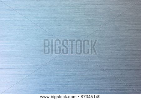 Brushed metal, blue tone.