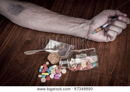 Syringe In Hand
