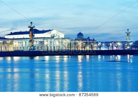 ST. PETERSBURG, RUSSIA - MARCH 18, 2015: Old Saint Petersburg Stock Exchange and Rostral columns on the spit of Vasilievsky island. The architectural complex was completed in 1811