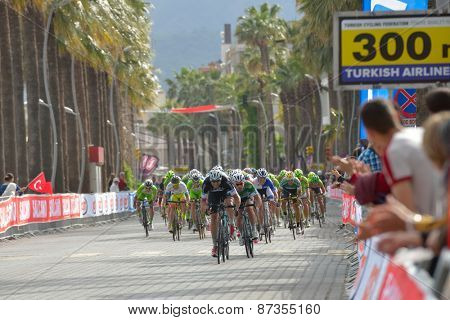 MARMARIS, TURKEY - APRIL 30, 2014: Riders on the finish of 4th stage of 50th Presidential Cycling Tour of Turkey. The first is Mark Cavendish from OPQ team
